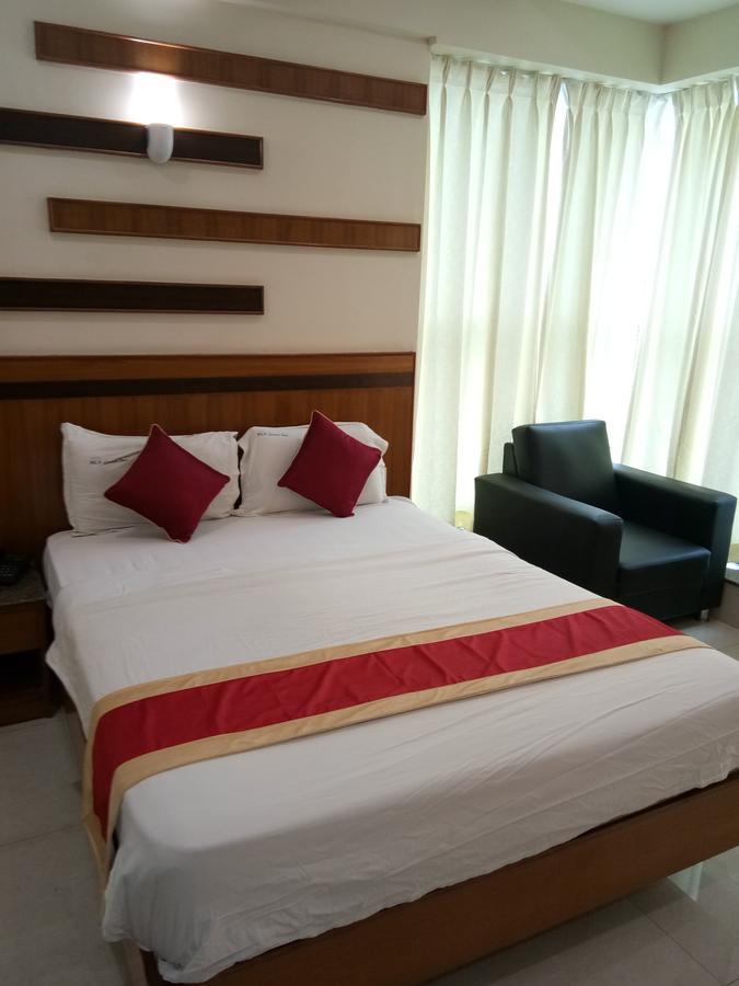 Hlv Grand Inn Бангалор Екстериор снимка
